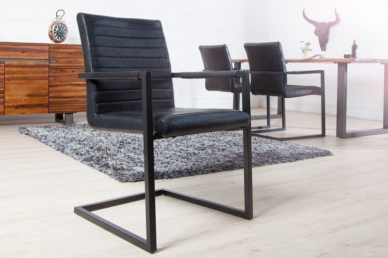 Lot de 4 chaises alliant simili cuir noir laqué et acier inoxydable
