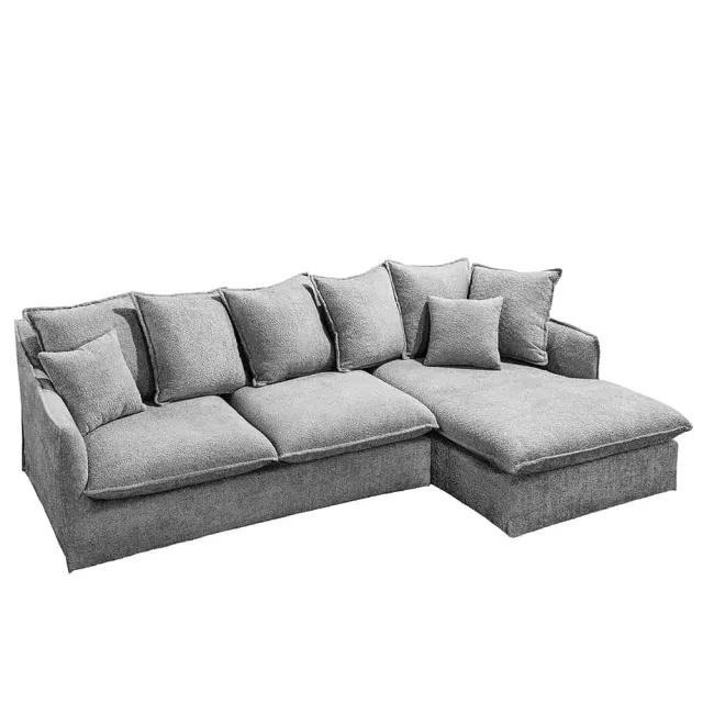 Canapé d’angle HEAVEN 255 cm – Bouclé gris, assise à ressorts Nosag, 8 coussins inclus