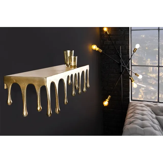 Étagère murale LIQUID LINE 60 cm – Métal doré antique, design sculptural façon goutte, fabrication artisanale