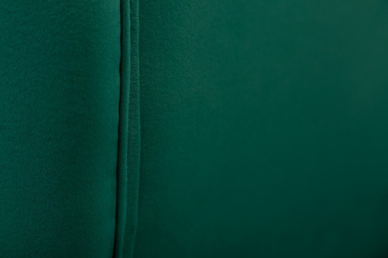 Fauteuil en velours coloris vert émeraude